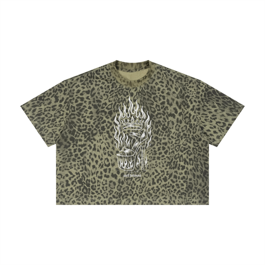 "well behaved." flaming heel leopard boxy tee in leopard green, front