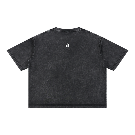 Back of the black "perfectly stimulated." mineral wash boxy tee with a small GG monogram