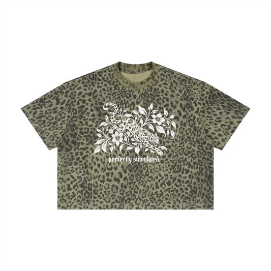 Leopard Green "perfectly stimulated." boxy tee with a leopard and florals print in ivory ink
